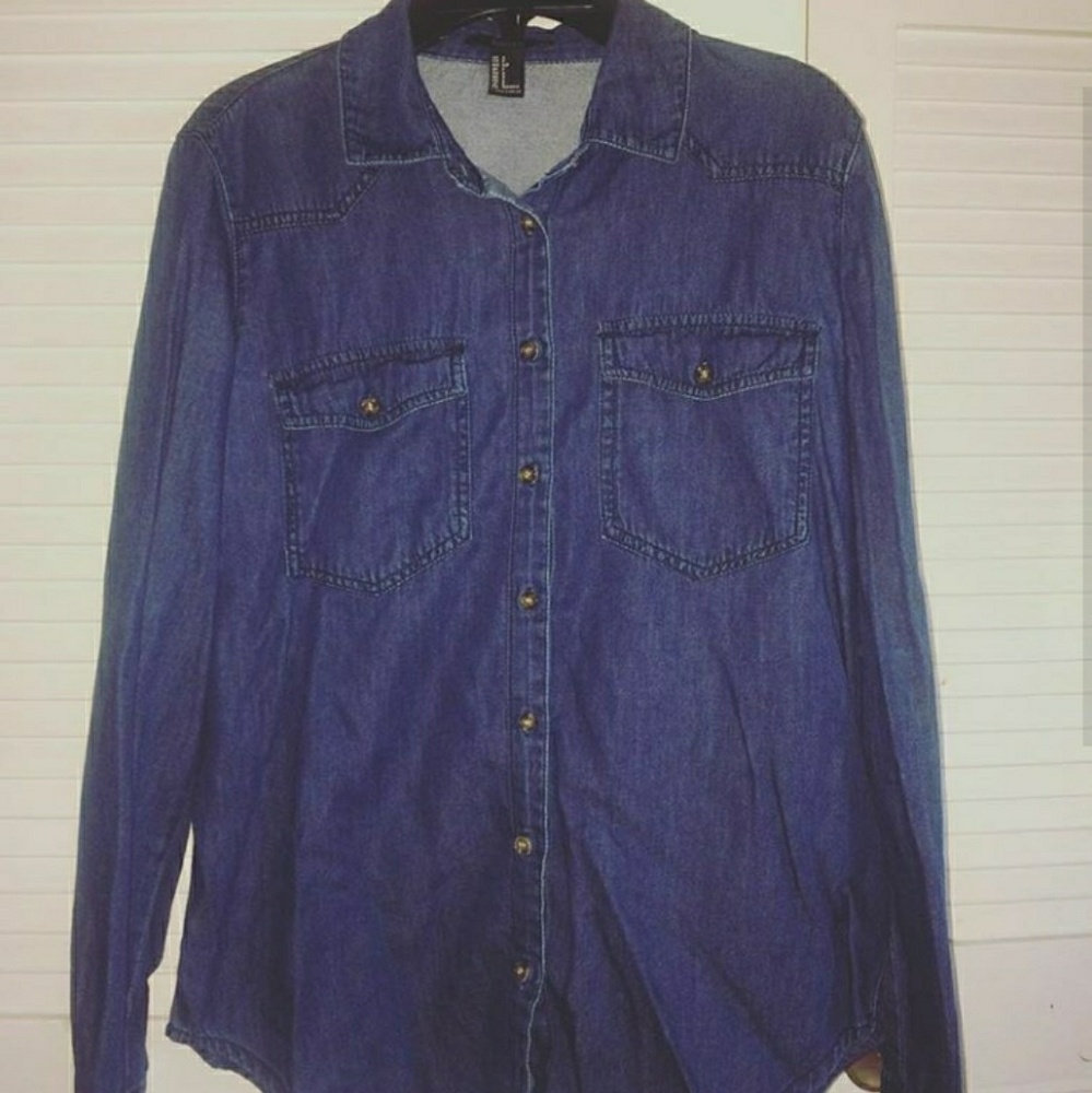 I'm selling a blue denim button up shirt